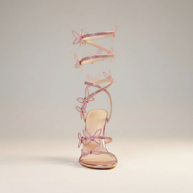 FJØRNA women's stiletto sandals with butterfly wrap design, rhinestone embellishments, and high heels for elegant style.