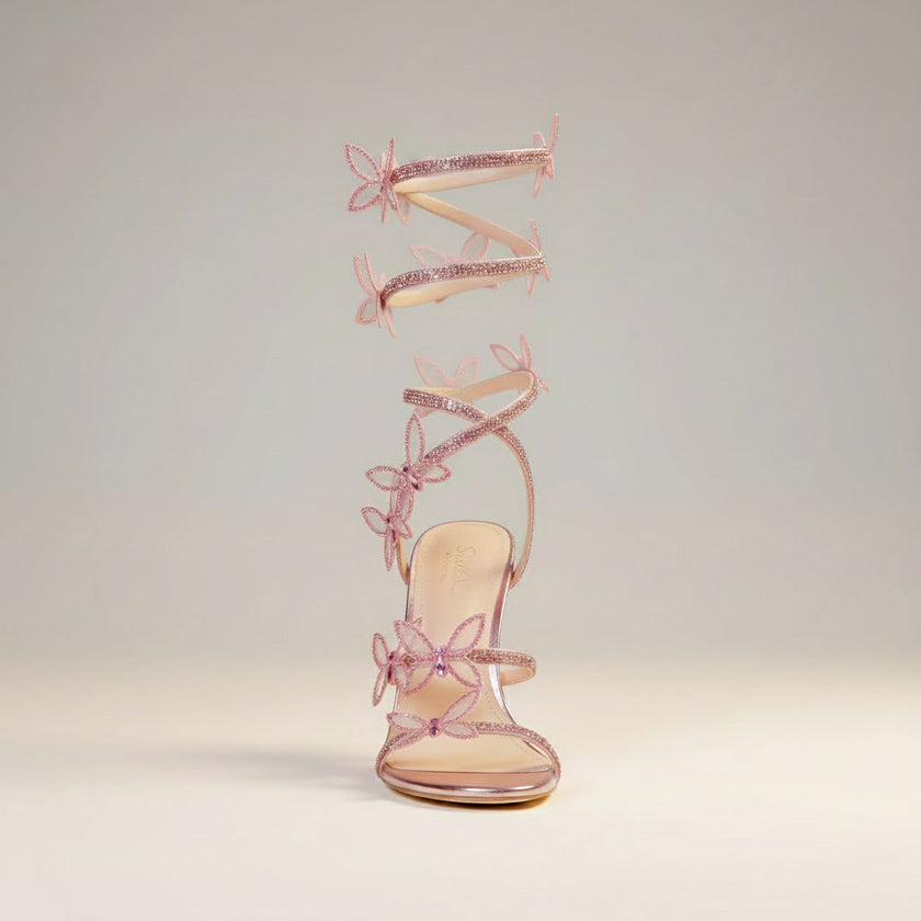 FJØRNA women's stiletto sandals with butterfly wrap design, rhinestone embellishments, and high heels for elegant style.