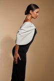 FJØRNA Ava off-shoulder midi dress in white with sculpted monochrome detail, stylish and elegant for special occasions.