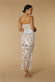 FJØRNA Willow strapless midi dress in ivory with floral 3D lace, featuring a fitted bodice and flowing skirt.