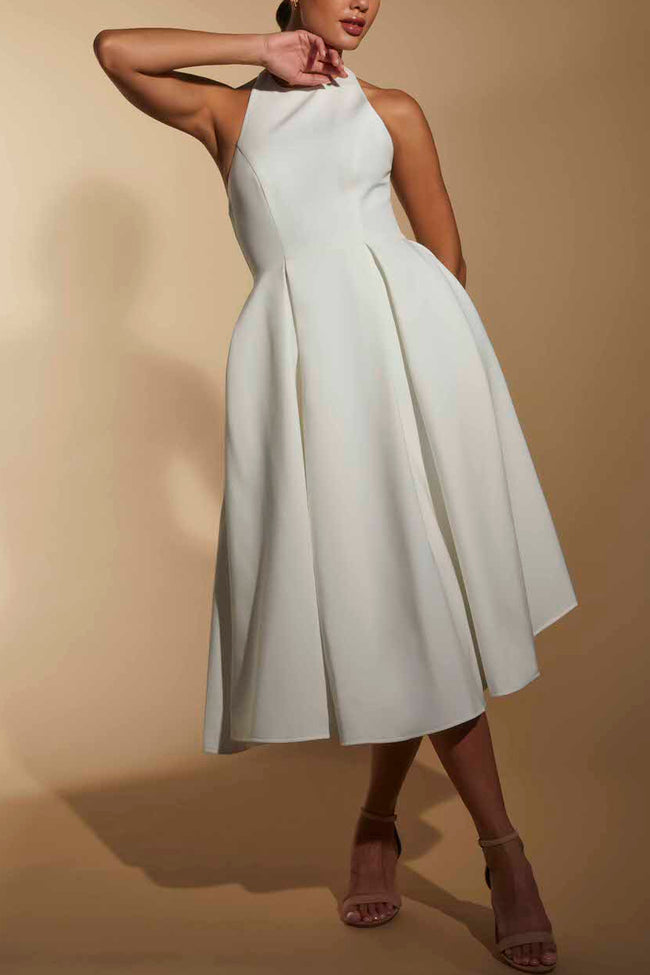 FJØRNA ivory line midi dress with halter neckline, flowing fabric, and elegant design, perfect for summer or special occasions.