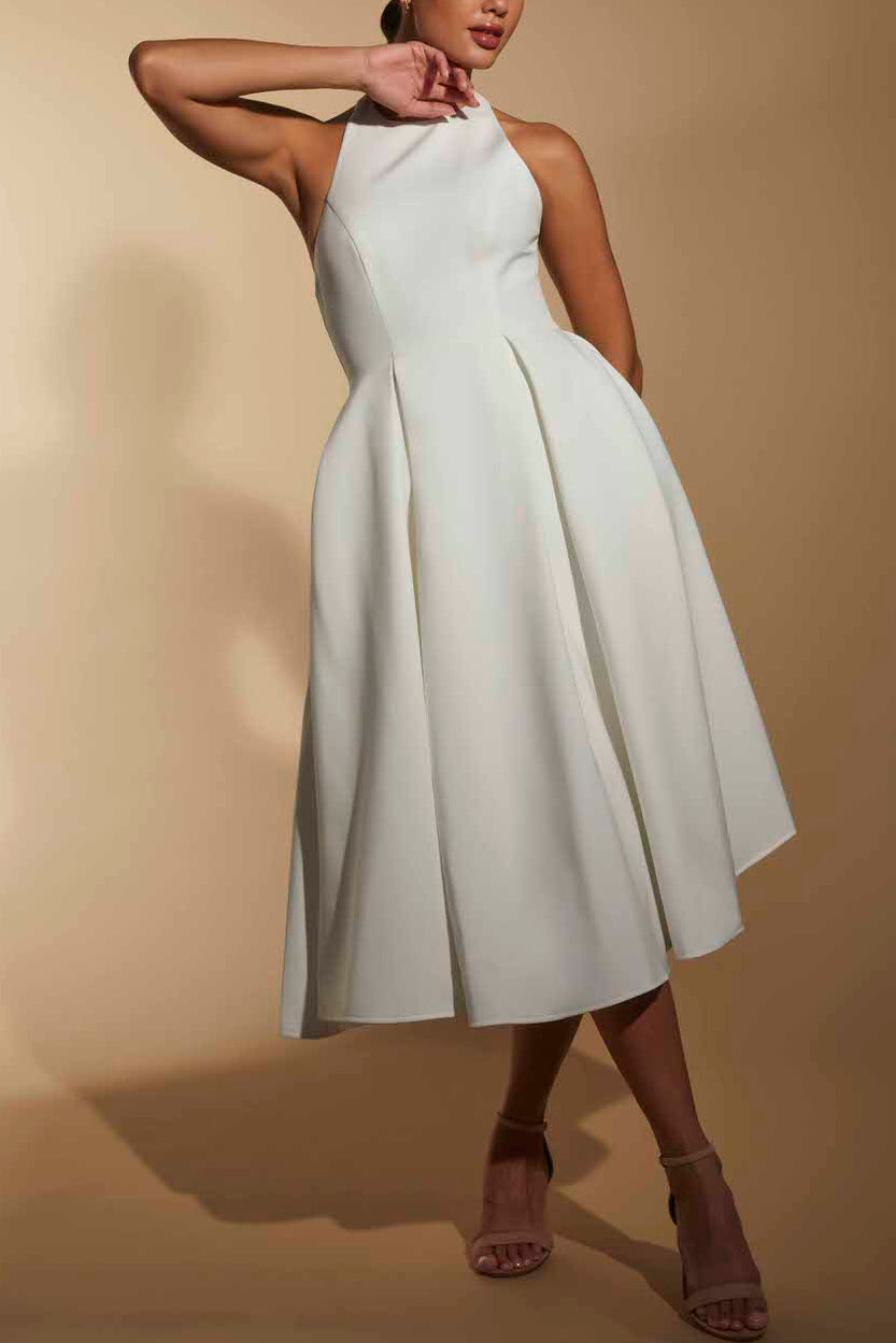 FJØRNA ivory line midi dress with halter neckline, flowing fabric, and elegant design, perfect for summer or special occasions.