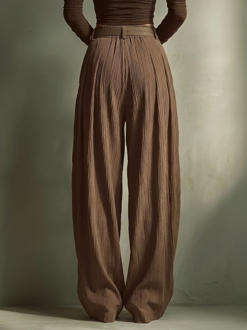 FJØRNA lightweight summer women's trousers with wide legs, high waist, and belt, casual and stylish for warm weather.
