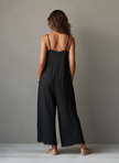 FJØRNA women's linen-blend spaghetti strap jumpsuit with lace neckline and frayed hem, loose-fit casual pants.
