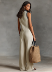 FJØRNA women's linen blend sleeveless jumpsuit with stand collar and embroidery detail, featuring stylish pant design.