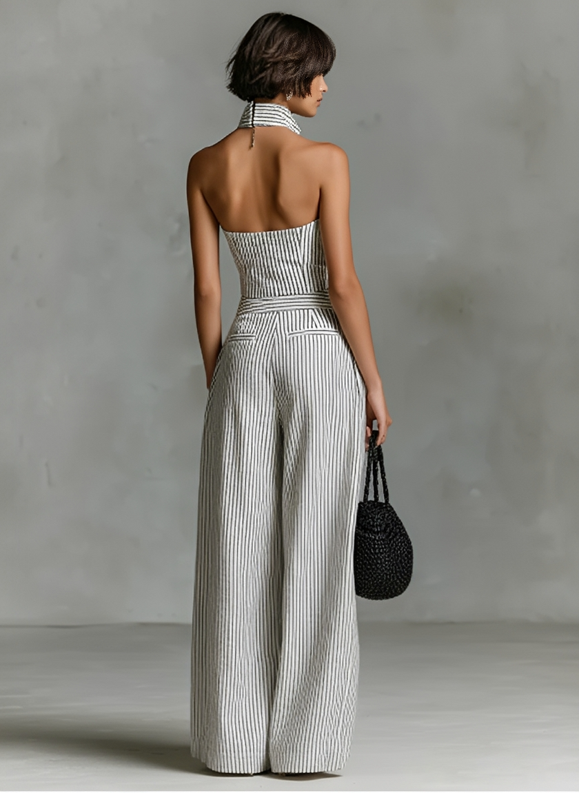 FJØRNA striped linen sleeveless jumpsuit for women with single-breasted design and V-neck, featuring pants style and casual chic look.
