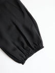 FJØRNA black chiffon top with wide-leg trousers three-piece set, elegant pants set featuring flowing fabric and stylish design.