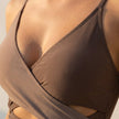FJØRNA women's summer one-piece swimsuit with a V-neck wrap design, featuring a stylish and flattering swimwear look.