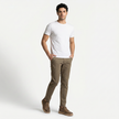 Men's synthetic lace-up low top sneakers by FJØRNA worn by a male model, full-body front view showing stylish casual footwear.