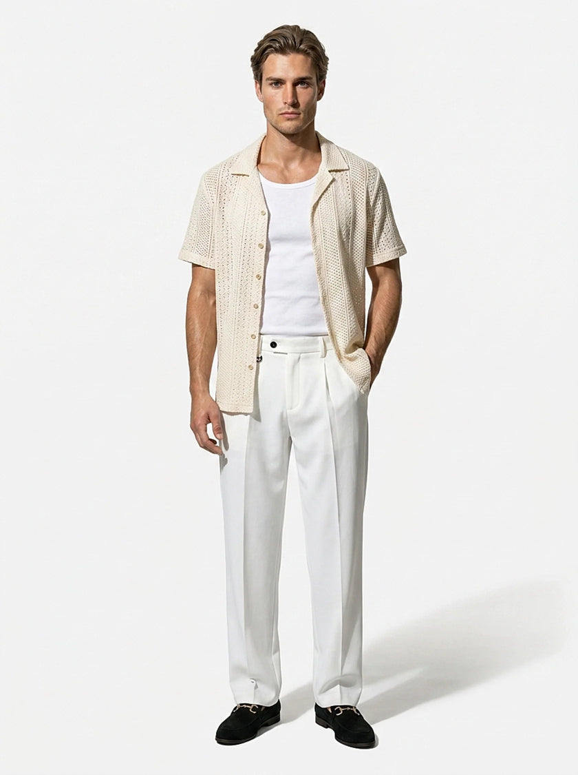 Man wearing FJØRNA straight fit tailored men's trousers, classic and versatile for everyday wear.