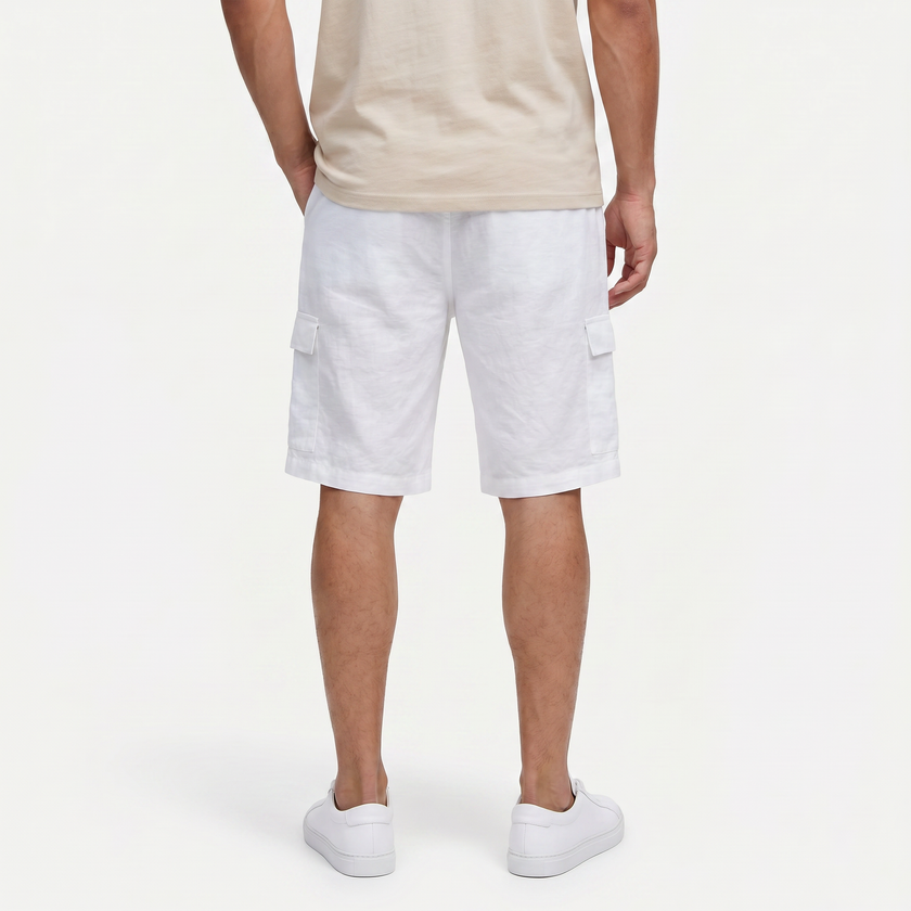 Men's linen cargo shorts with drawstring waist by FJØRNA, showing lightweight fabric and multiple cargo pockets.