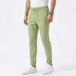 FJØRNA men's stretchable comfort trousers, casual pants with flexible fabric, shown in a relaxed fit style.