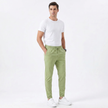 Men's stretchable comfort trousers by FJØRNA, showing the tailored fit and fabric texture of the men's pants.