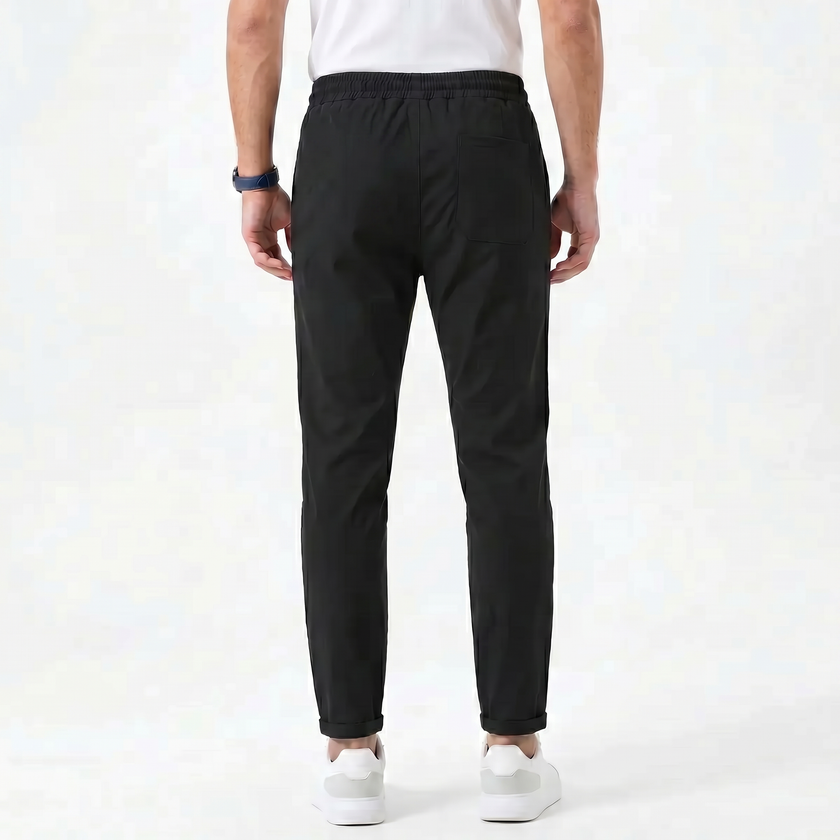 Men's stretchable comfort trousers by FJØRNA, lightweight men's pants with a relaxed fit and elastic waistband.