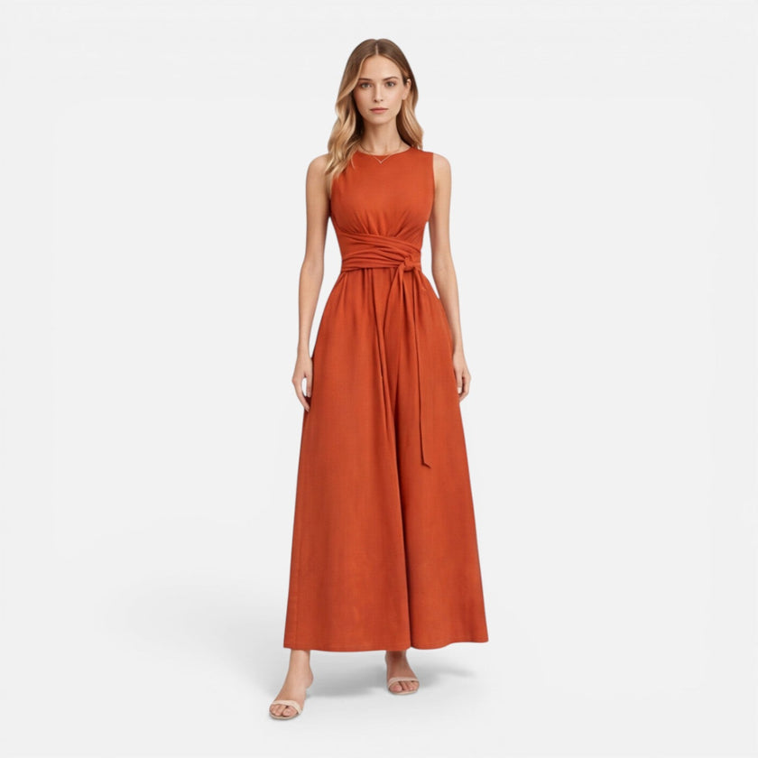 Elegant women's summer maxi dress by FJØRNA with twist waist detail and sleeveless design, perfect for warm-weather wear.