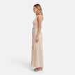 Elegant women's summer maxi dress by FJØRNA with twist waist detail and sleeveless design, perfect for warm weather.