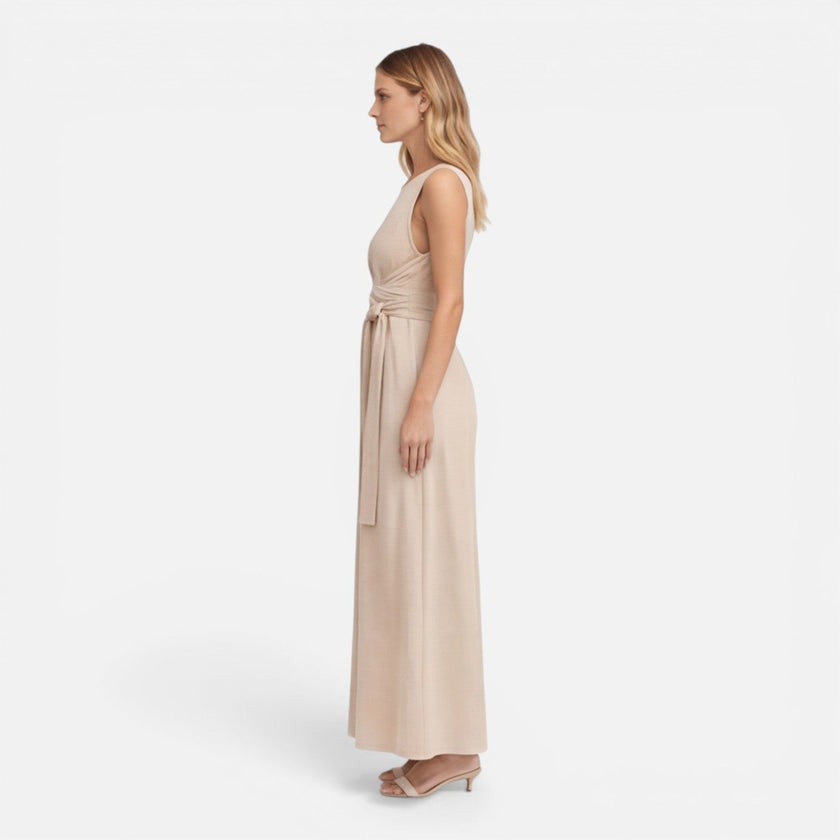 Elegant women's summer maxi dress by FJØRNA with twist waist detail and sleeveless design, perfect for warm weather.