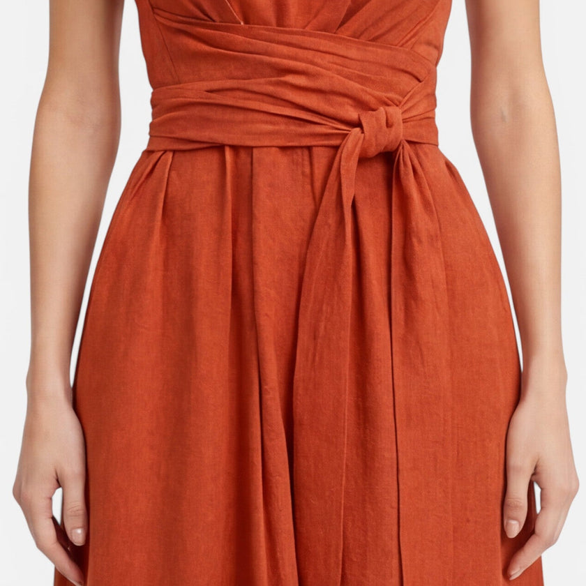 Elegant women's summer maxi dress by FJØRNA featuring a twist waist and sleeveless design, perfect for warm-weather occasions.