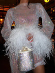 FJØRNA sequin feather mini dress with long sleeves, sheer details, fitted silhouette, and feather cuffs for women’s cocktail parties