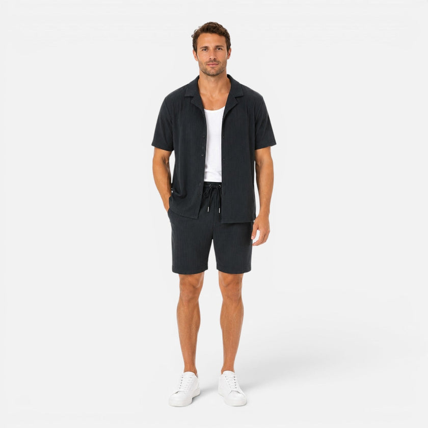 Men's lightweight summer set by FJØRNA featuring a textured shirt and matching shorts for casual warm-weather wear.