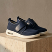 Red mesh men's trainers with breathable fabric and velcro straps, designed for comfort and walking support by FJØRNA.