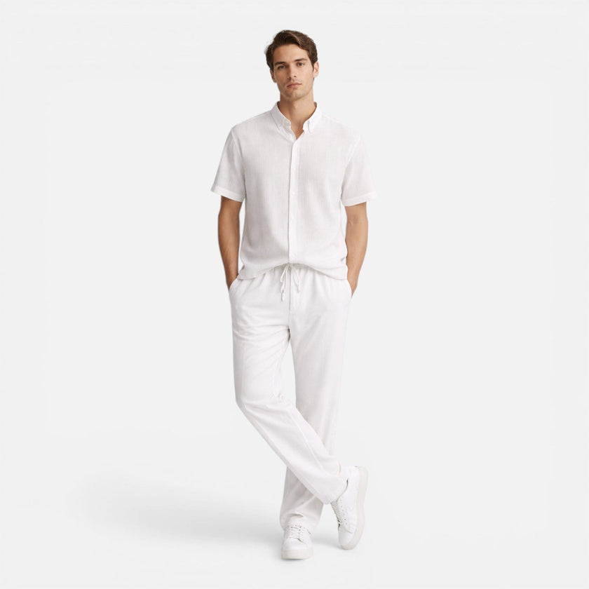 Men's casual 2-piece set from FJØRNA featuring a short sleeve shirt and matching pants, ideal for relaxed everyday wear.