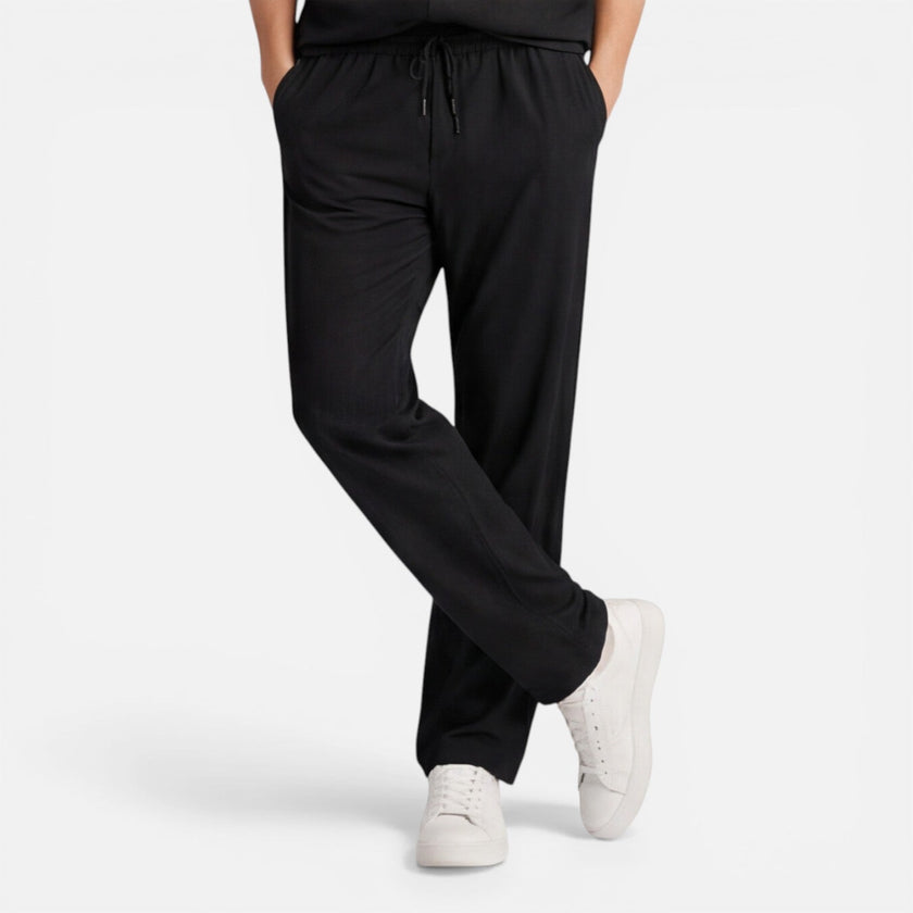 Men's casual 2-piece set by FJØRNA featuring a short sleeve shirt and matching pants, ideal for relaxed everyday wear.