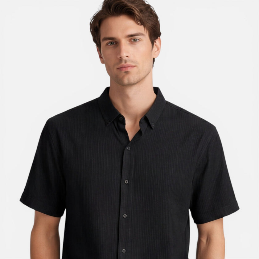 Men's casual 2-piece set by FJØRNA featuring short sleeve shirt and matching pants, ideal for relaxed everyday wear.