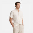 Men's casual 2-piece set by FJØRNA featuring a short sleeve shirt and matching pants, ideal for comfortable everyday wear.