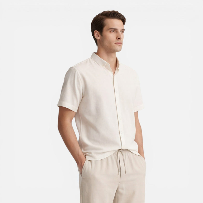 Men's casual 2-piece set by FJØRNA featuring a short sleeve shirt and matching pants, ideal for comfortable everyday wear.