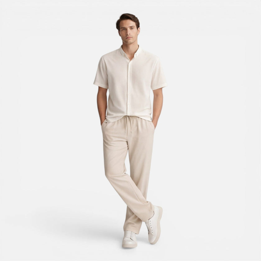 Men's casual 2-piece set by FJØRNA featuring short sleeve shirt and pants, ideal for relaxed everyday wear.