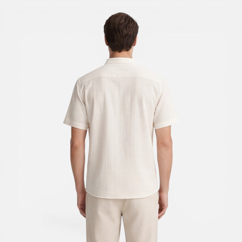 Men's casual 2-piece set from FJØRNA with short sleeve shirt and matching pants, perfect for relaxed everyday wear.