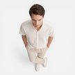 Men's casual 2-piece set by FJØRNA featuring a short sleeve shirt and matching pants, styled for relaxed everyday wear.