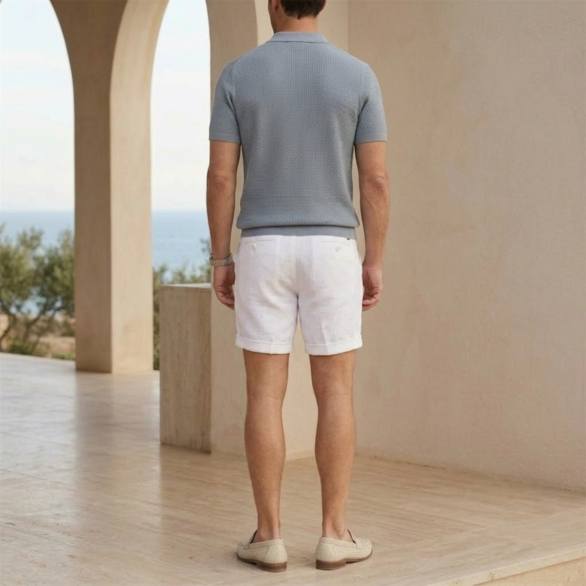 Men's cotton linen blend shorts by FJØRNA, lightweight and tailored with a relaxed fit, suitable for casual warm-weather wear.