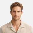 Men's linen shirt and shorts set by FJØRNA, breathable summer co-ord for casual warm-weather wear, shown on a model.