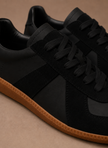 Men's FJØRNA low-top casual sneakers in lightweight suede, featuring a sleek design and comfortable fit for everyday wear.