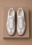 Men's FJØRNA low-top casual sneakers in lightweight suede, featuring a sleek design and comfortable fit for everyday wear.