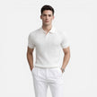Men's slim fit ribbed knit polo shirt in premium cotton by FJØRNA, showcasing the textured fabric and classic collar design.