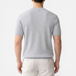 Men's lightweight ribbed knit slim fit T-shirt by FJØRNA, short-sleeve summer tee, shown in a natural fit on a model.