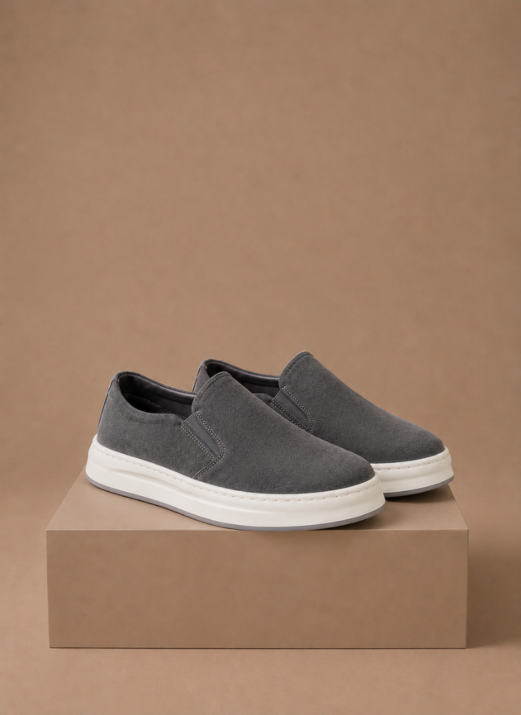 Men's suede slip-on sneakers by FJØRNA featuring casual everyday loafer style, with a sleek, comfortable design.