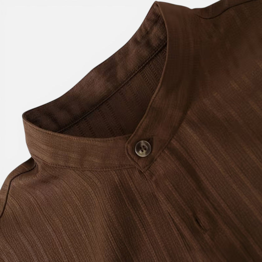 Men's summer matching set by FJØRNA featuring a lightweight short-sleeve shirt and trousers, perfect for warm weather.