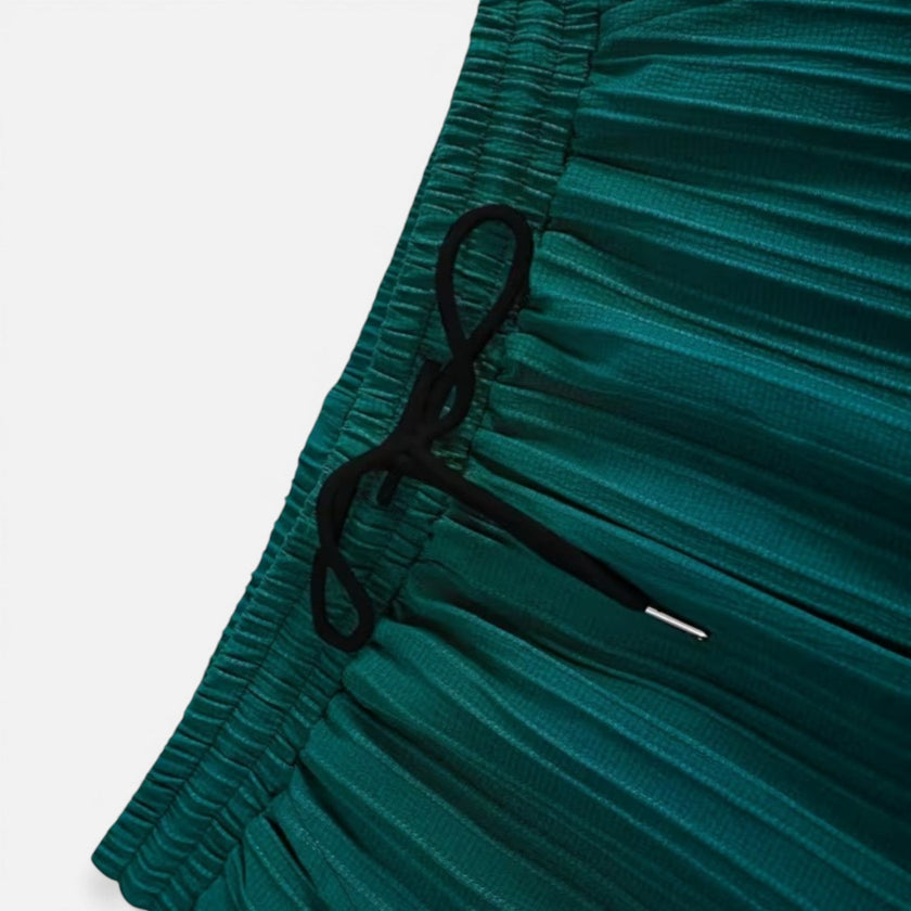 Men's summer matching set by FJØRNA featuring a lightweight short-sleeve shirt and trousers, ideal for warm weather.