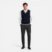 Men's wool sweater vest with V-neck and cable knit design, casual business style, by FJØRNA.