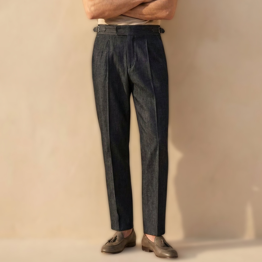 Men's high waist straight leg casual trousers by FJØRNA, showing the fit and tailored design in a neutral fabric.