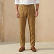 Men's linen blend straight leg trousers by FJØRNA with drawstring waist, relaxed fit, ideal for casual and comfortable style.