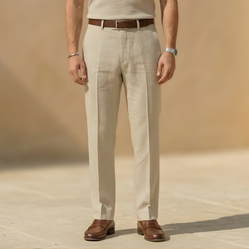 Men's linen blend straight leg trousers by FJØRNA featuring a pleated relaxed fit and classic design.