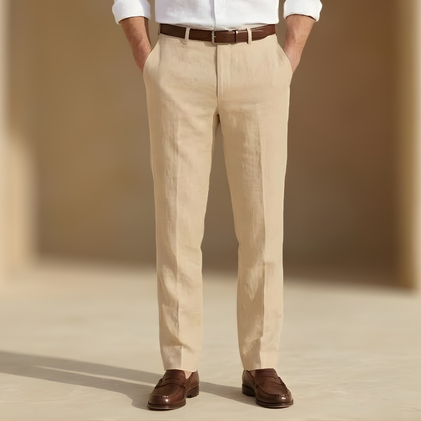 Men's linen straight leg trousers by FJØRNA featuring pleats, tailored for a smart, casual look.