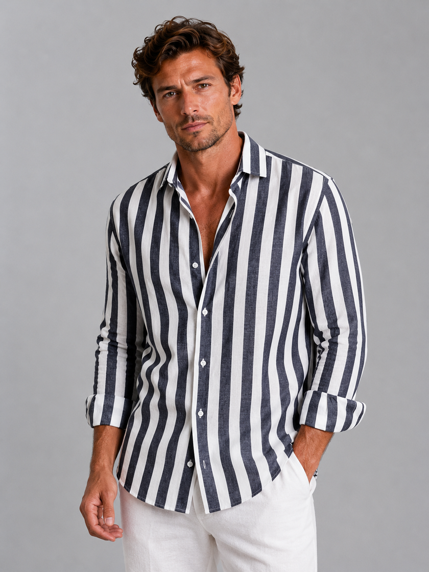Men's striped linen-look shirt by FJØRNA featuring a relaxed summer button-up style, displayed on a male model in a casual setting.
