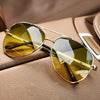 Men's aviator sunglasses with metal double bridge frame by FJØRNA, featuring classic aviator lens design and sleek metal construction.