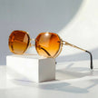 Men's geometric sunglasses with metal frame and gradient lenses, stylish FJØRNA eyewear for a modern look.